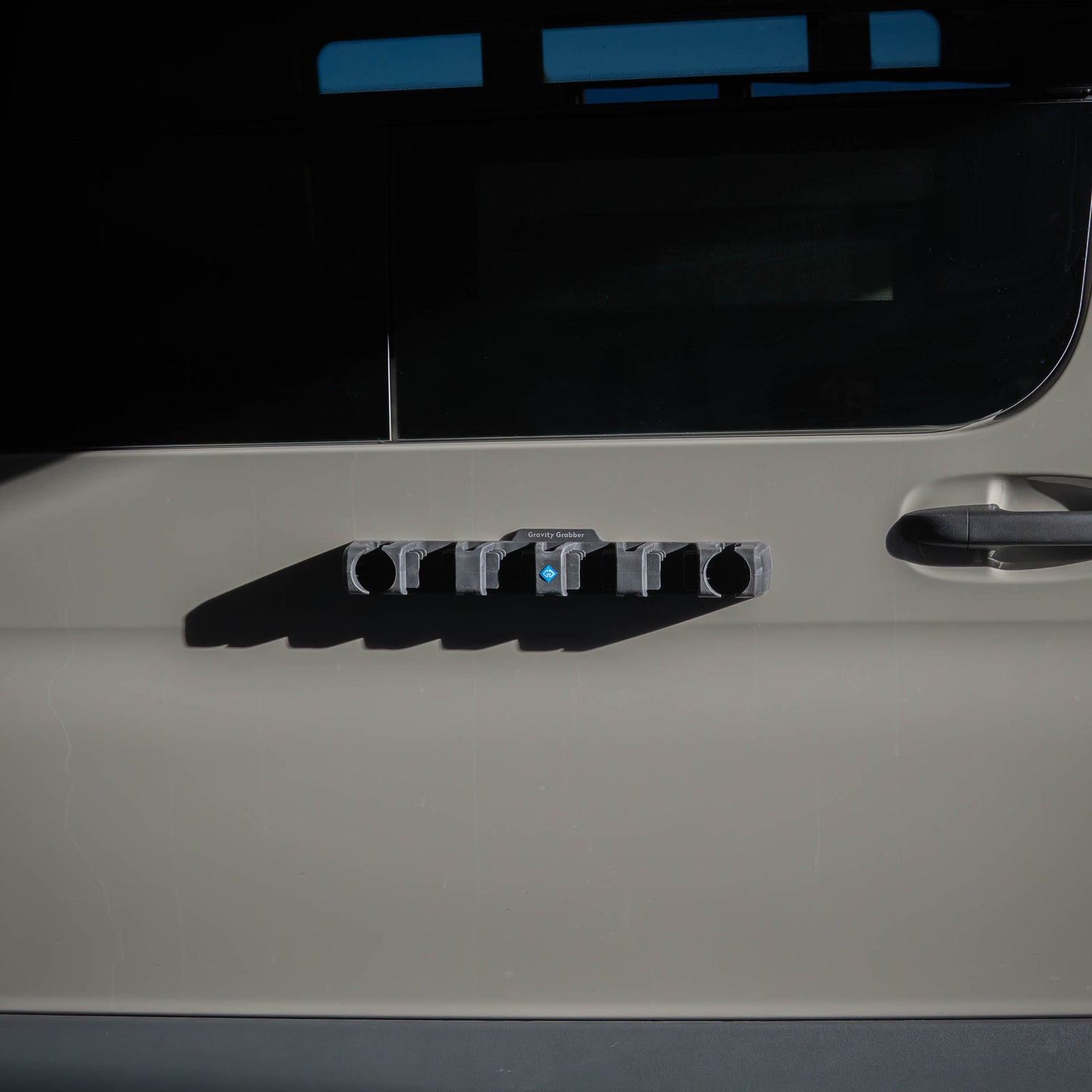 The Magnetic Grab Bar: The Easiest Way to Protect Your Gear and Your Car